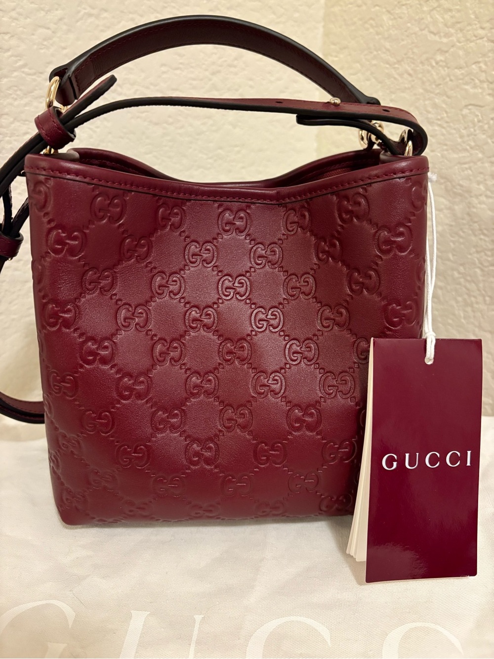 Gucci  GG Emblem Small Bucket Bag Rosso Burgundy Red